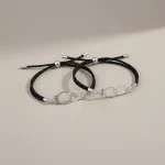 Bracelet corde couple menottes acier inoxydable - Vue 1 - bracelet corde